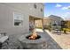 Outdoor patio with fire pit and seating at 1150 Blarney St, Minneola, FL 34715