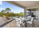 Relaxing patio with seating area and view at 1150 Blarney St, Minneola, FL 34715