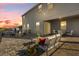 Spacious backyard patio with fire pit at 1150 Blarney St, Minneola, FL 34715