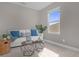 Sitting area with comfy sofa and two side tables at 1150 Blarney St, Minneola, FL 34715