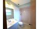 Bathroom with shower/tub combo and updated vanity at 1344 Cr 437, Lake Panasoffkee, FL 33538