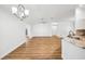 Spacious living room with hardwood floors and high ceilings at 1589 Arial Pl, The Villages, FL 32162