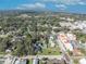 An aerial view showcasing a single Gathering home with a pool in a quiet neighborhood at 214 S Woodland St, Winter Garden, FL 34787