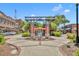 Centennial Plaza entrance with brick columns and flags at 214 S Woodland St, Winter Garden, FL 34787