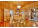 Bright dining room with wood table and chairs, built-in hutch at 214 S Woodland St, Winter Garden, FL 34787