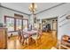 Classic dining room featuring hardwood floors, a wood table, and a chandelier at 214 S Woodland St, Winter Garden, FL 34787