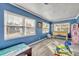 Cheerful playroom featuring blue walls, a foosball table, and toys at 214 S Woodland St, Winter Garden, FL 34787