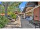 Picturesque sidewalk with benches and inviting shops and restaurants at 214 S Woodland St, Winter Garden, FL 34787