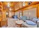 Sunroom with tiled floor, comfortable seating and daybed at 214 S Woodland St, Winter Garden, FL 34787