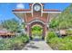 Ornate brick archway with clock in Winter Garden at 214 S Woodland St, Winter Garden, FL 34787