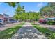 Scenic walkway through tree-lined Winter Garden square at 214 S Woodland St, Winter Garden, FL 34787
