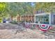 Brick-paved street with shops and outdoor seating at 214 S Woodland St, Winter Garden, FL 34787