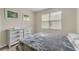 Comfortable bedroom featuring double bed and dresser at 360 Tupelo Cir, Davenport, FL 33897