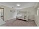 Bedroom with a bunk bed and access to another bedroom at 360 Tupelo Cir, Davenport, FL 33897