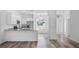 Modern kitchen with stainless steel appliances and granite countertops at 40630 E Eighth Ave, Umatilla, FL 32784