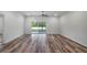 Spacious living area with sliding glass doors leading to the backyard at 40630 E Eighth Ave, Umatilla, FL 32784