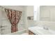 Bathroom with a shower/tub combo, patterned curtain, and vanity at 4414 Cameo Cir, The Villages, FL 32163