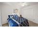 Guest bedroom with a double bed, ceiling fan and large closet at 4414 Cameo Cir, The Villages, FL 32163