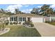 Charming single story house with a well-manicured lawn at 4414 Cameo Cir, The Villages, FL 32163