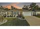 Attractive single-story home with landscaped yard and driveway at 4414 Cameo Cir, The Villages, FL 32163