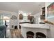 Open kitchen with a breakfast bar and view into the living room at 4414 Cameo Cir, The Villages, FL 32163