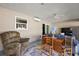 Sunroom with seating area, table, and ceiling fan at 4414 Cameo Cir, The Villages, FL 32163