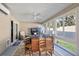 Bright sunroom with comfortable seating and large windows at 4414 Cameo Cir, The Villages, FL 32163