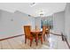 Dining room with a wood table and six chairs at 501 Gibson St, Leesburg, FL 34748