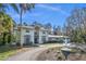 Two-story house with a circular driveway and fountain at 501 Gibson St, Leesburg, FL 34748