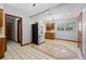 Kitchen with wood cabinets, stainless steel appliances, and tile floor at 501 Gibson St, Leesburg, FL 34748