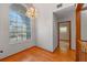Bright office space with hardwood floors and large window at 501 Gibson St, Leesburg, FL 34748