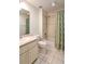 Clean bathroom with tub, toilet, and vanity at 5107 Aurora Dr, Leesburg, FL 34748