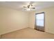 Bright bedroom with carpeted floor and ceiling fan at 5107 Aurora Dr, Leesburg, FL 34748