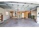 Spacious garage with ample storage and work area at 5107 Aurora Dr, Leesburg, FL 34748