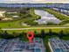 Aerial view of the property and surrounding area at 840 Pebble Beach Dr, Davenport, FL 33896