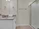 Modern bathroom with a walk-in shower and updated vanity at 840 Pebble Beach Dr, Davenport, FL 33896