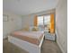 King-size bed and nightstands in a well-lit bedroom at 840 Pebble Beach Dr, Davenport, FL 33896