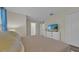 King-size bed and ensuite bathroom in a bedroom at 840 Pebble Beach Dr, Davenport, FL 33896