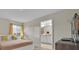 Bright bedroom with ensuite bathroom and large bed at 840 Pebble Beach Dr, Davenport, FL 33896