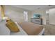 Comfortable bedroom with a dresser and a large bed at 840 Pebble Beach Dr, Davenport, FL 33896