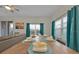 Dining area with wooden table and seating for six at 840 Pebble Beach Dr, Davenport, FL 33896