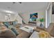 Spacious living room with sectional sofa and large TV at 840 Pebble Beach Dr, Davenport, FL 33896