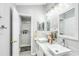 Elegant bathroom with double sinks, modern fixtures, and a shower at 1087 Welch Hill Cir, Apopka, FL 32712