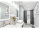 Spa-like bathroom with double sinks, a bathtub, and updated features at 1087 Welch Hill Cir, Apopka, FL 32712