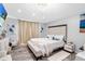 Spacious bedroom with large bed, stylish decor, and plenty of natural light at 1087 Welch Hill Cir, Apopka, FL 32712