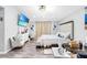 Bright bedroom featuring a large bed, modern decor, and ample space at 1087 Welch Hill Cir, Apopka, FL 32712
