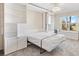 Bedroom with built-in white shelving and murphy bed at 1201 De La Fuente Ct, The Villages, FL 32162