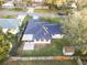 Aerial view of the house, highlighting the backyard and fence at 130 Frosti Way, Eustis, FL 32726