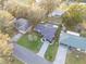 An aerial view of the house, driveway and yard at 130 Frosti Way, Eustis, FL 32726