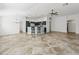 Modern kitchen with an island and dark cabinetry at 16791 Se 91St Phillips Ct, The Villages, FL 32162